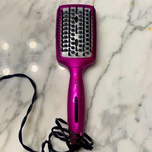 Brush straightener gets very hot has low medium and high settings used once